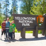 Family by Yelllowstone Sign